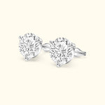 Elegant diamond stud earrings set in white gold with four-prong settings.