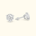 Round diamond stud earrings in a sleek silver setting, showcasing brilliance and elegance.