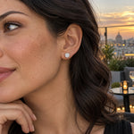 4.00 CTW round lab-grown diamond stud earrings in a signature three-prong martini-style 14kt white gold setting.