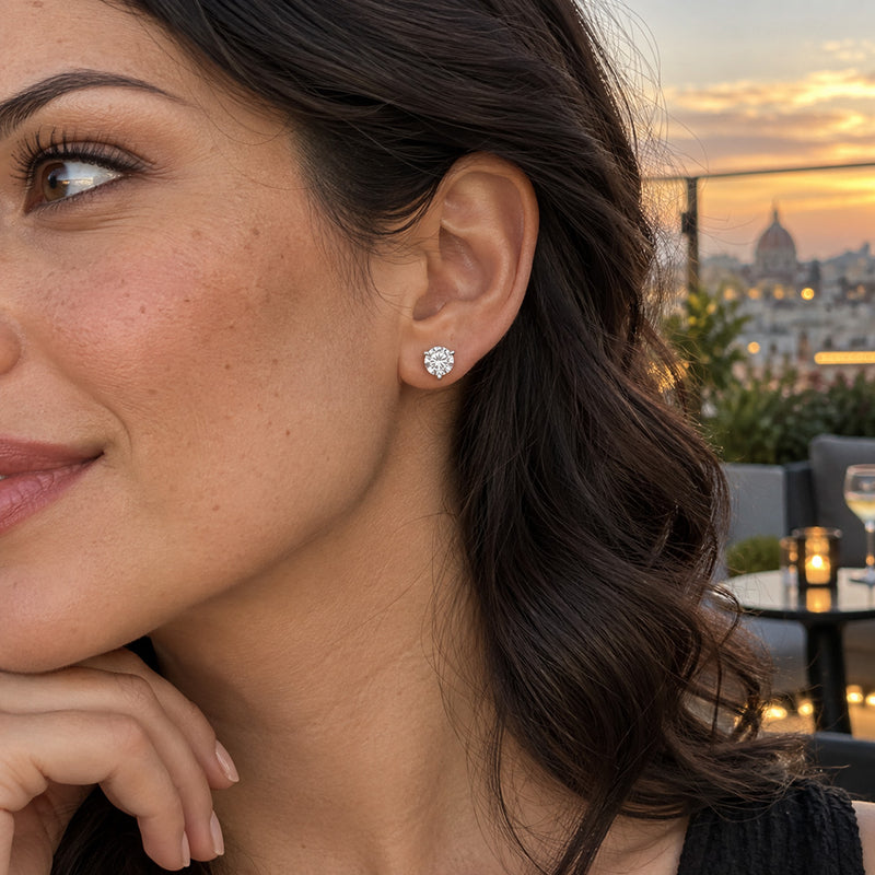 4.00 CTW round lab-grown diamond stud earrings in a signature three-prong martini-style 14kt white gold setting.
