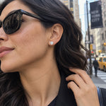 1.00 CTW round lab-grown diamond stud earrings in a signature three-prong martini-style 14kt white gold setting.