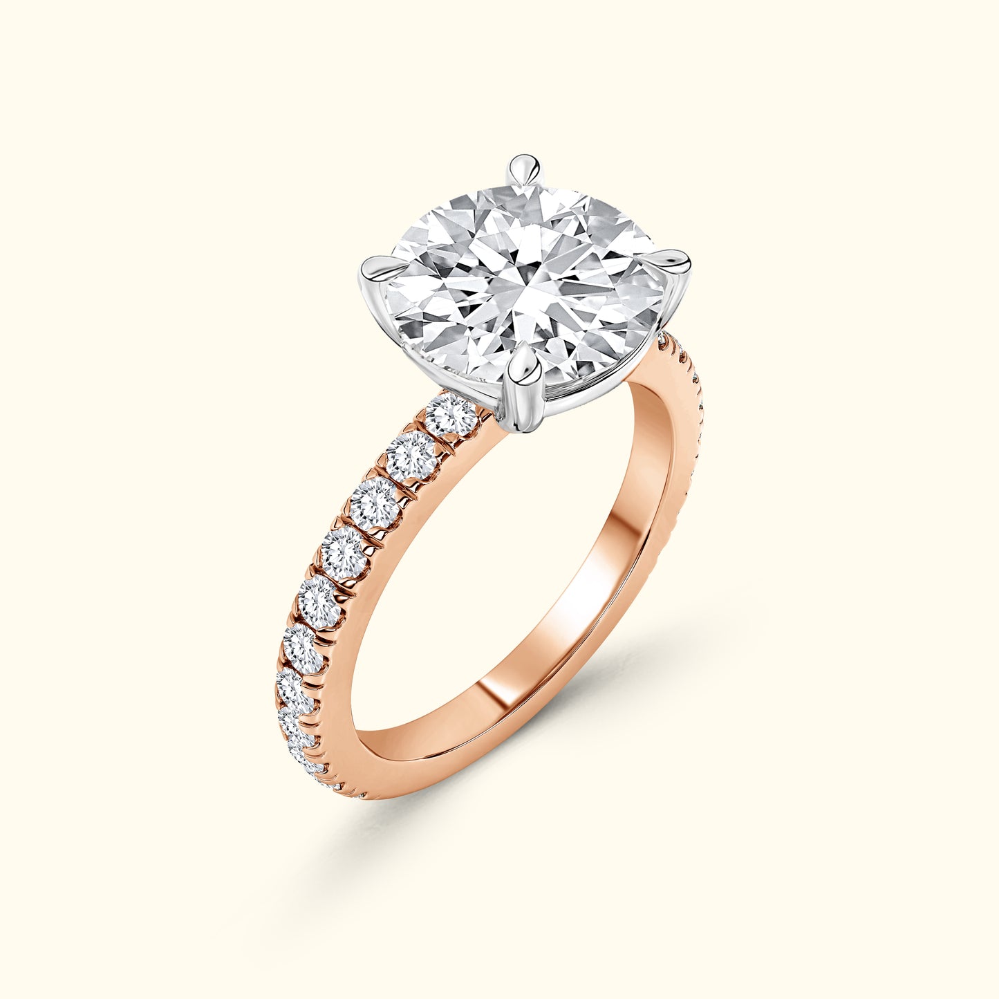 Rose gold engagement ring with a large central diamond and smaller diamonds along the band.