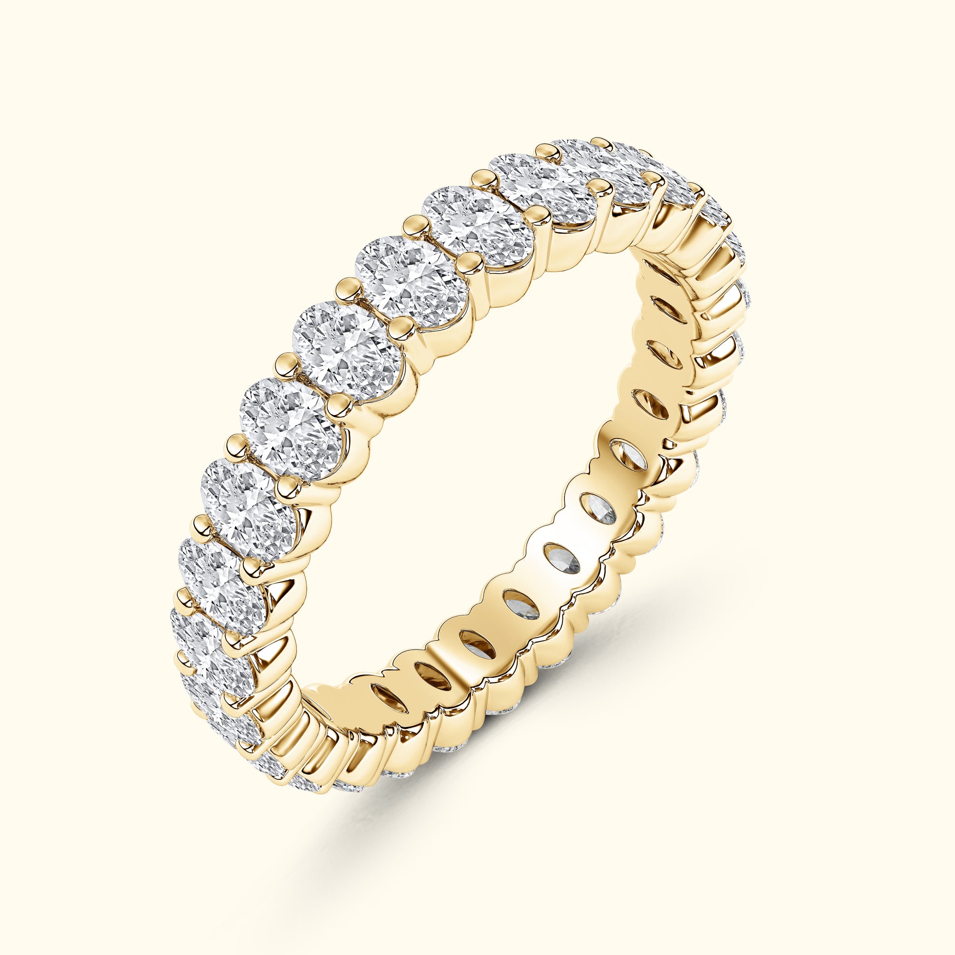 Gold band ring adorned with sparkling round diamonds, showcasing a timeless design.