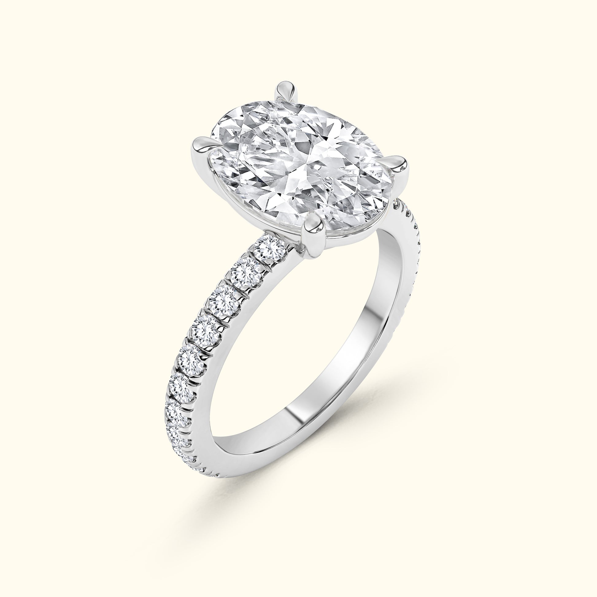 Elegant silver ring featuring an oval double diamond center and a sparkling band.