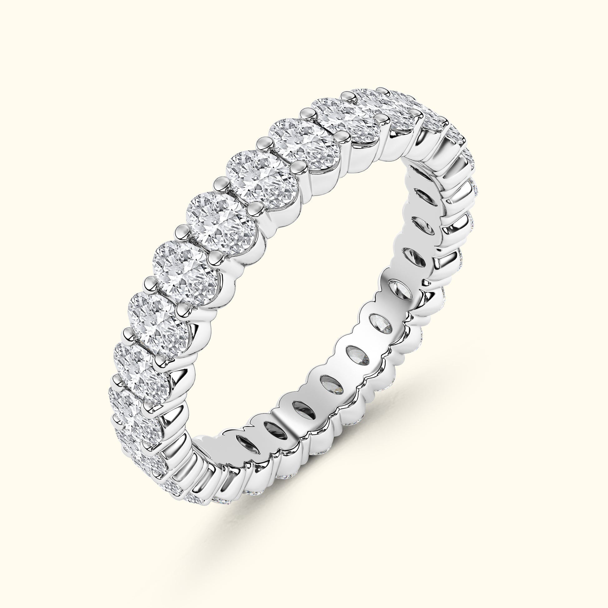 A sparkling diamond eternity band with a row of round-cut diamonds set in white gold.