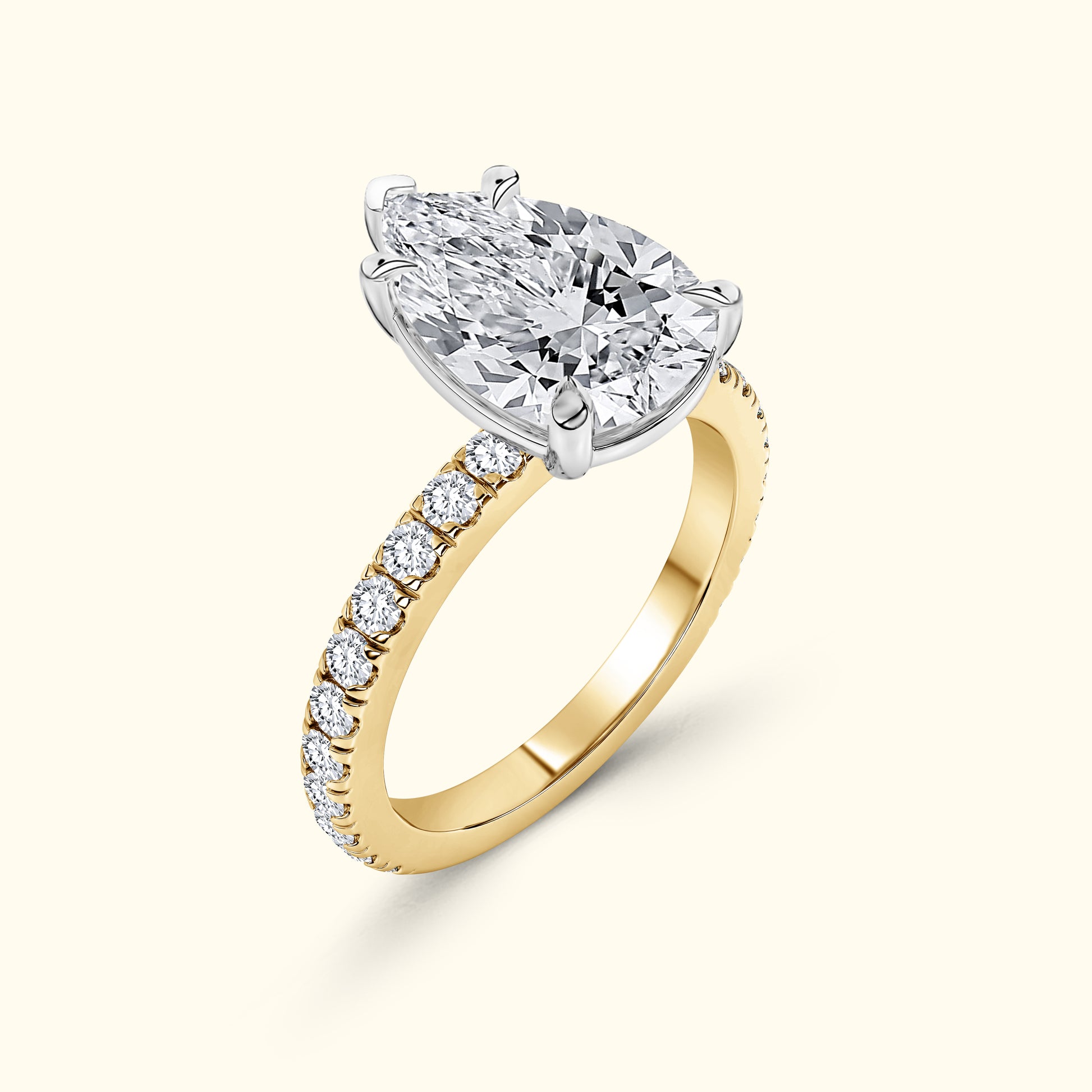 Elegant gold ring with a large, sparkling diamond and smaller stones along the band.