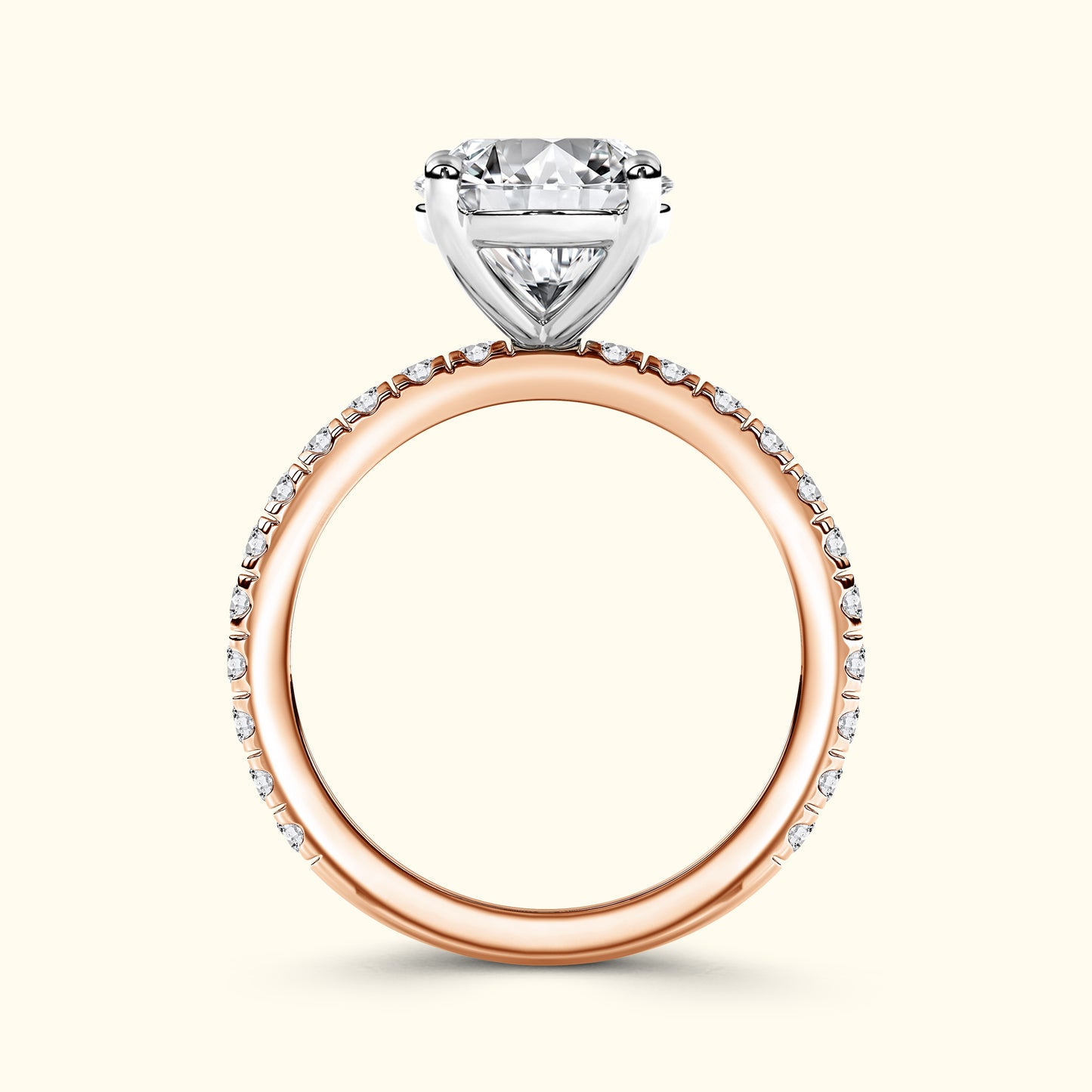 Rose gold engagement ring featuring a large sparkling diamond and smaller side stones.