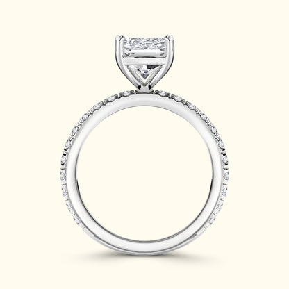 Elegant solitaire diamond ring with a sleek silver band and accent diamonds.