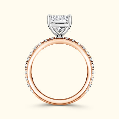 Elegant rose gold and white gold engagement ring with a square diamond centerpiece.