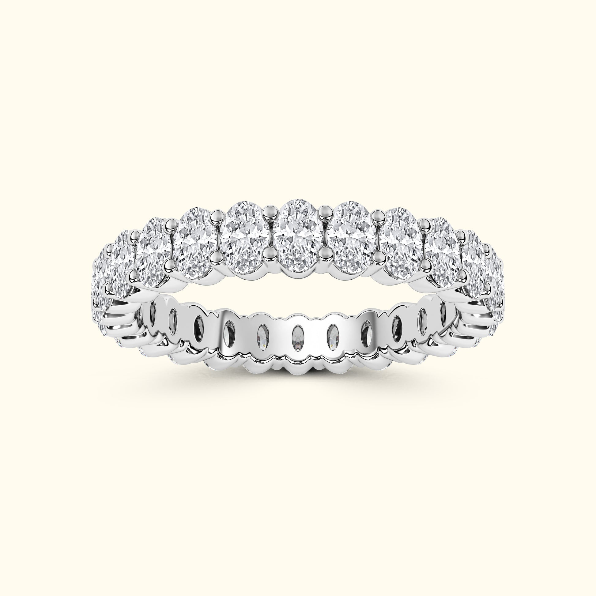 Silver band ring adorned with multiple sparkling round diamonds.