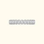 A shimmering diamond band featuring oval-cut diamonds set in a sleek platinum setting.
