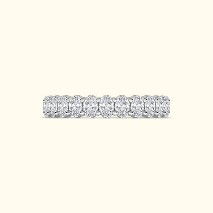 A shimmering diamond band featuring oval-cut diamonds set in a sleek platinum setting.