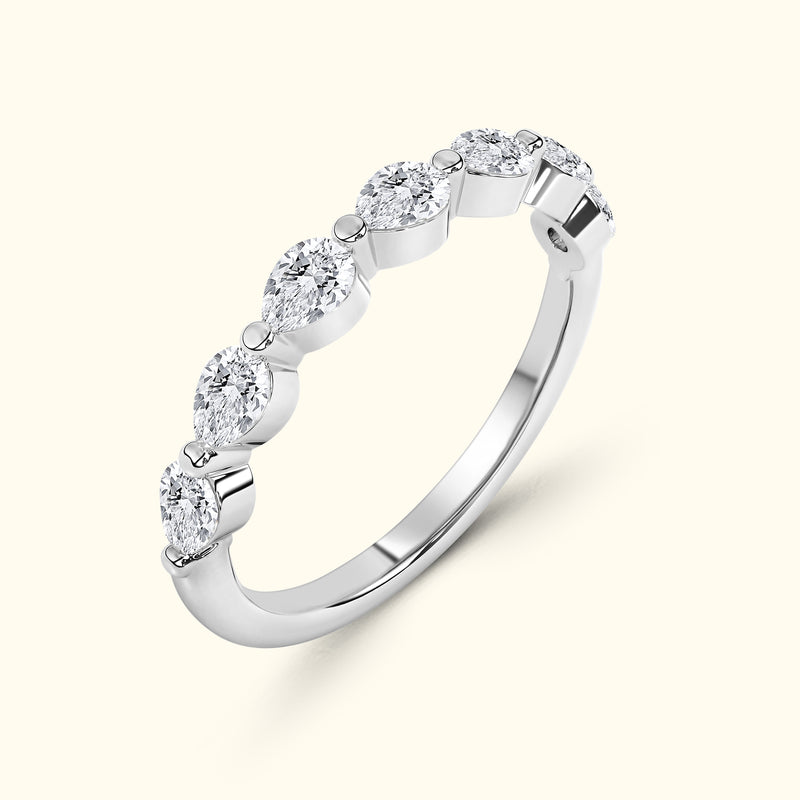 Elegant silver ring adorned with five sparkling oval diamonds.