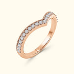 Rose gold ring with a curved design adorned with sparkling round diamonds.