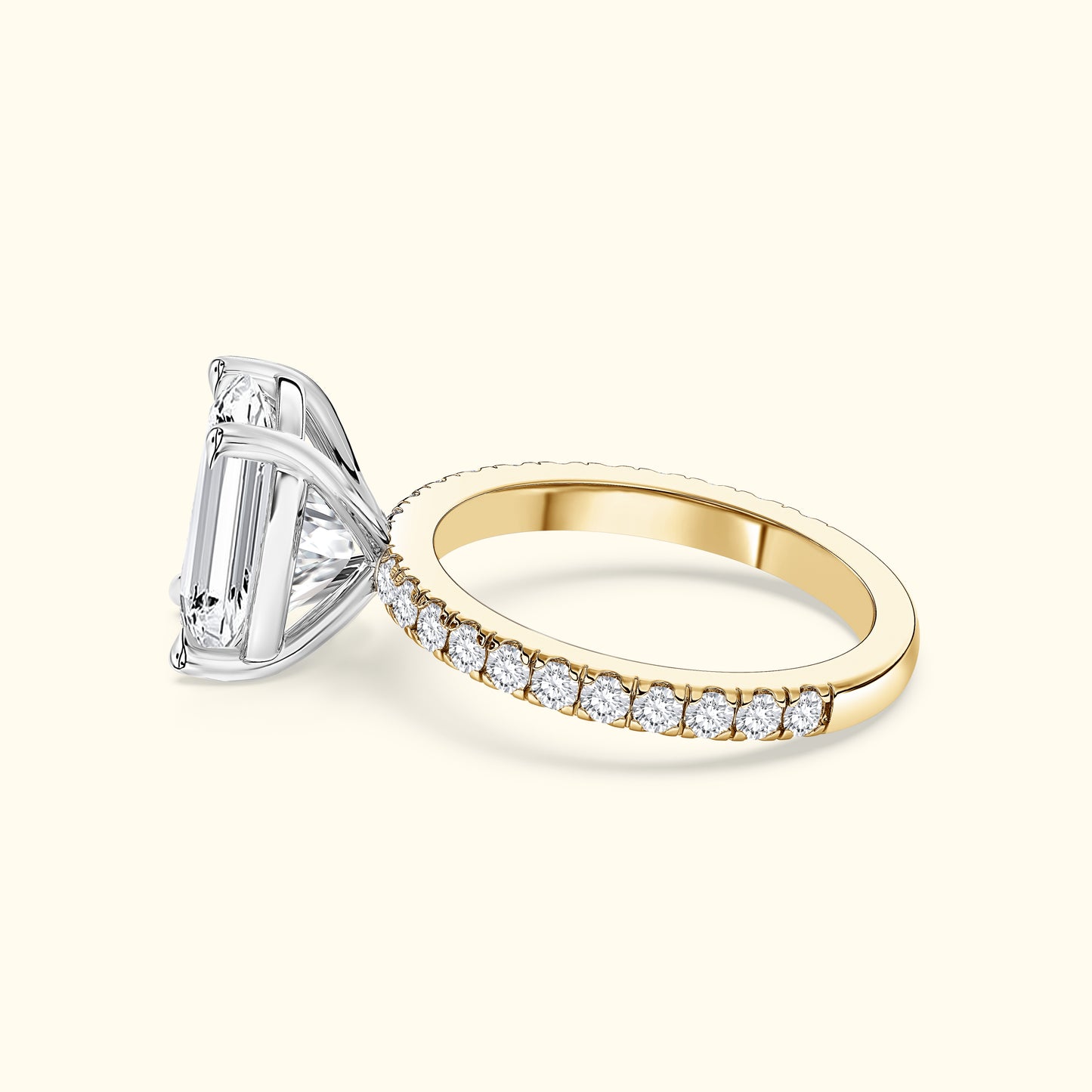 Elegant two-tone diamond ring featuring a large emerald-cut center stone and a sparkling band.