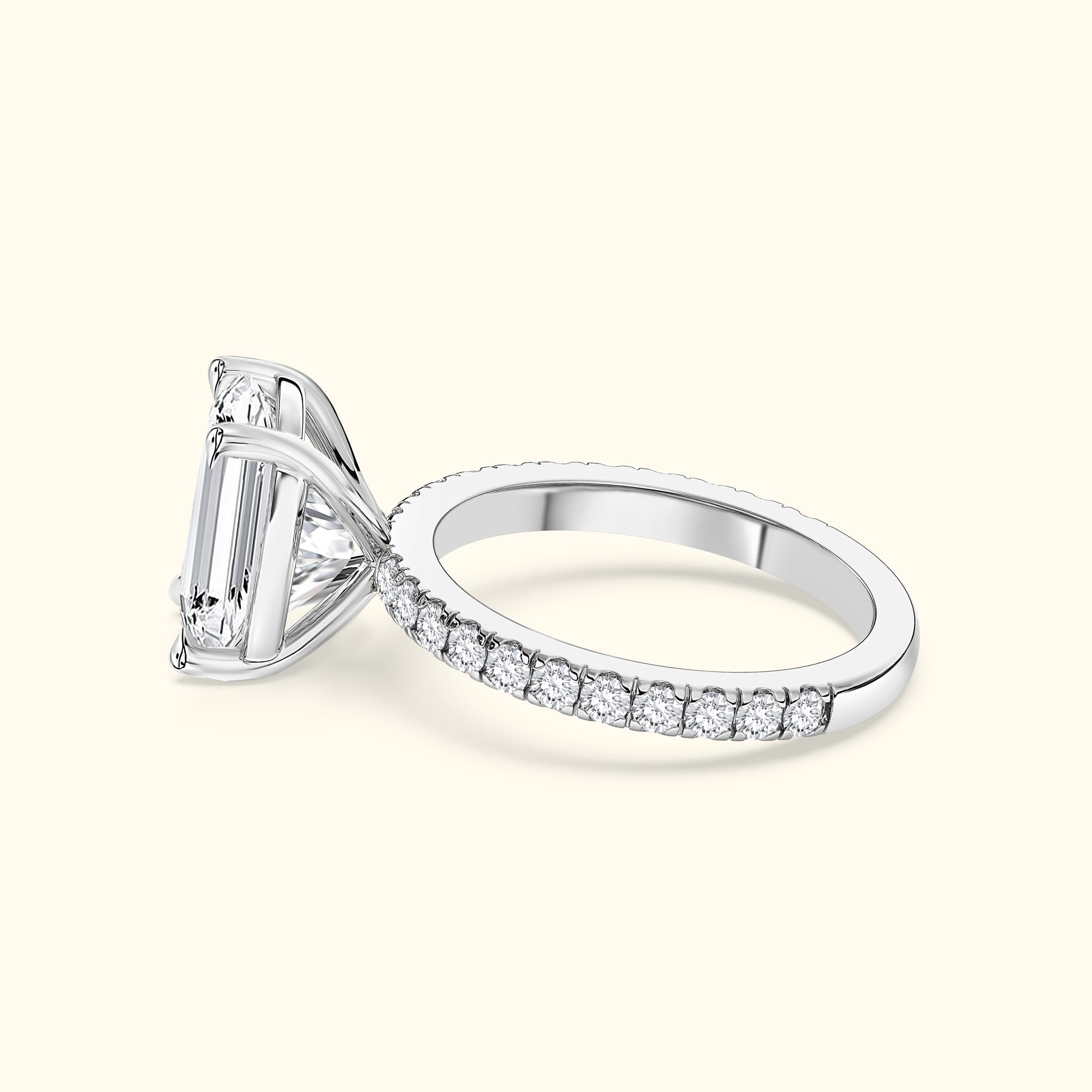 Elegant diamond ring with a large central stone and smaller diamonds on the band.