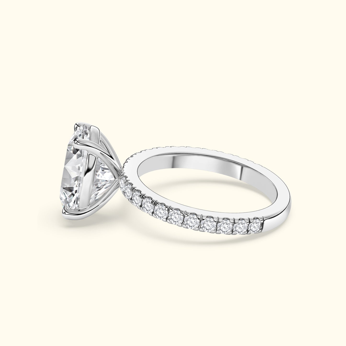 Elegant silver ring featuring a large diamond and smaller stones along the band.