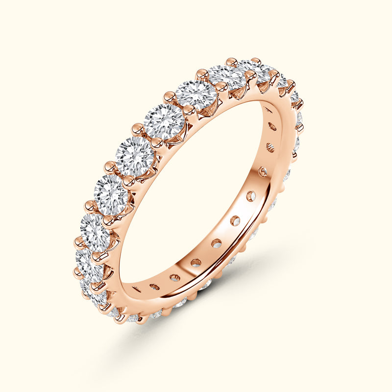 Rose gold ring adorned with sparkling round diamonds.