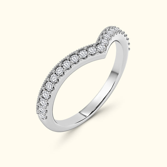 Elegant silver ring with a wavy band set with small sparkling diamonds.