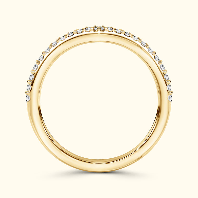 Gold band with sparkling diamonds along the top edge.