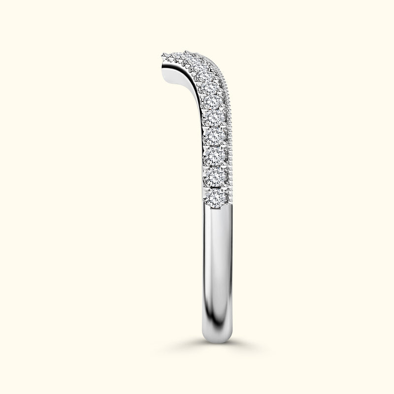 Elegant silver ring adorned with sparkling diamonds along the top.