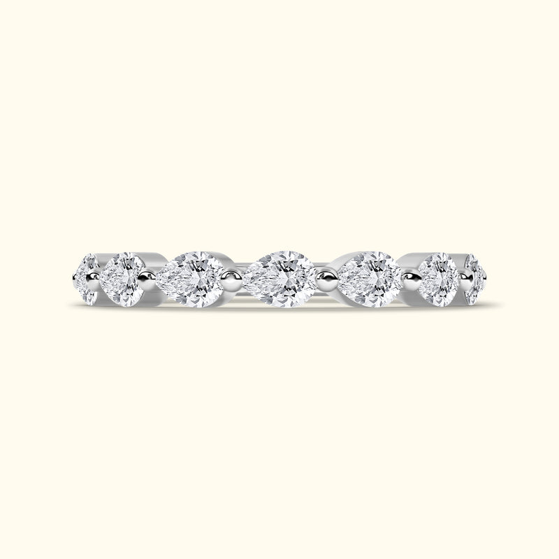 Elegant silver band featuring alternating marquise and round cut diamonds.