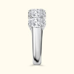 Sleek silver ring showcasing two sparkling round diamonds set side by side.