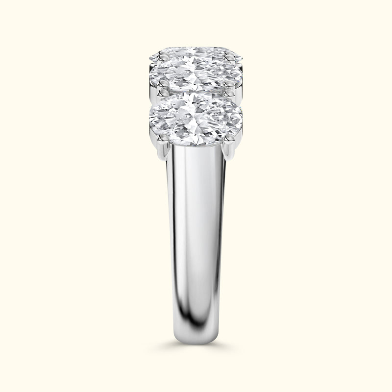 Sleek silver ring showcasing two sparkling round diamonds set side by side.