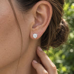 2.00 CTW round lab-grown diamond stud earrings in a signature three-prong martini-style 14kt white gold setting.