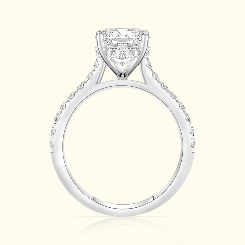 Elegant diamond engagement ring with a halo setting and pave band.