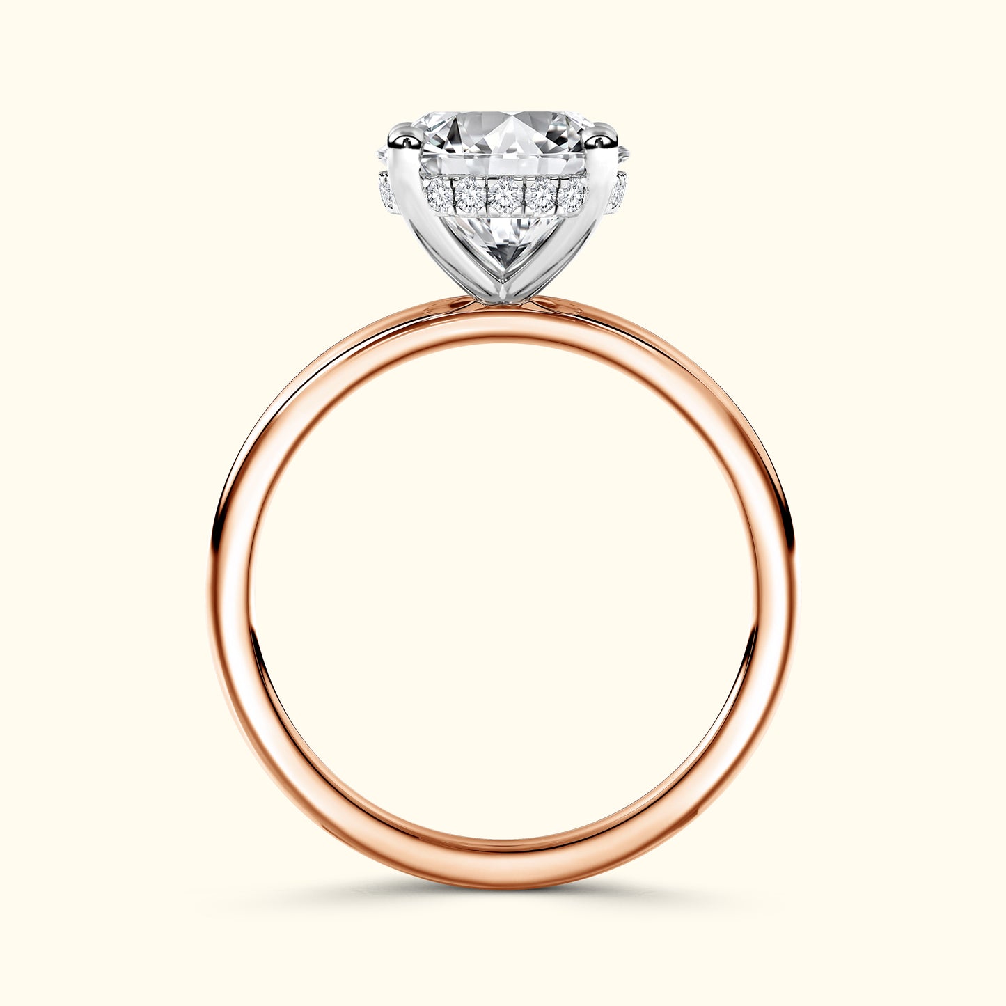 Solitaire engagement ring featuring a large diamond atop a rose gold band.