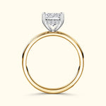 Gold and silver engagement ring featuring a square diamond centerpiece.