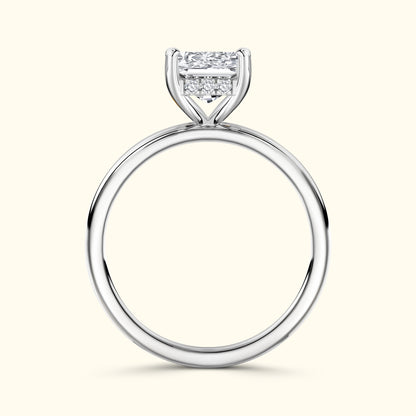 Sterling silver engagement ring featuring a prominent rectangular diamond setting.