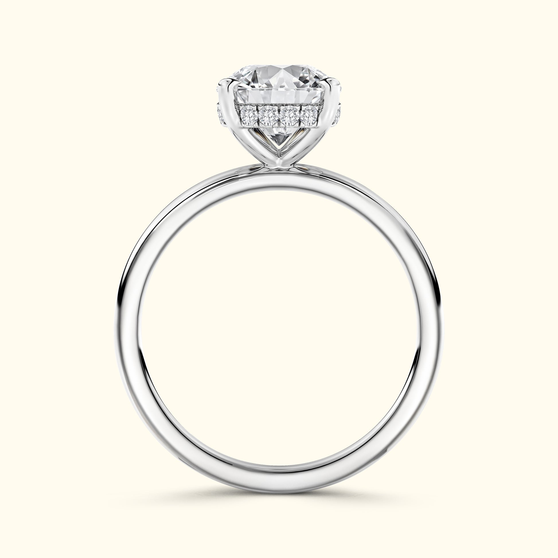 Elegant silver engagement ring featuring a large round diamond and smaller accent stones.