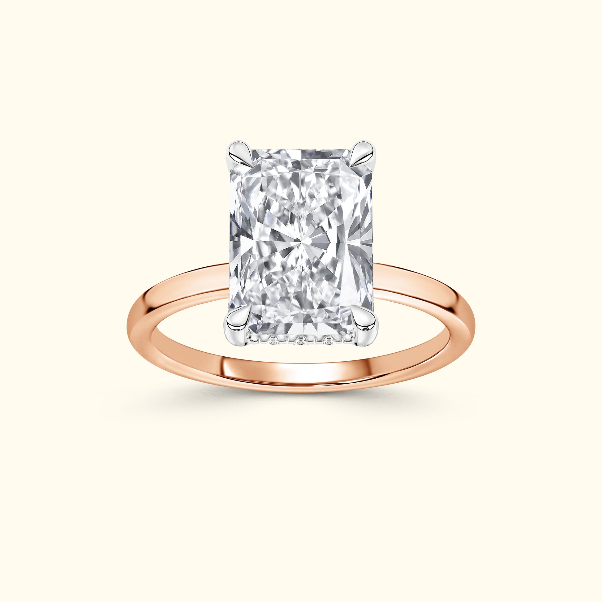 Rectangular diamond ring set in rose gold.