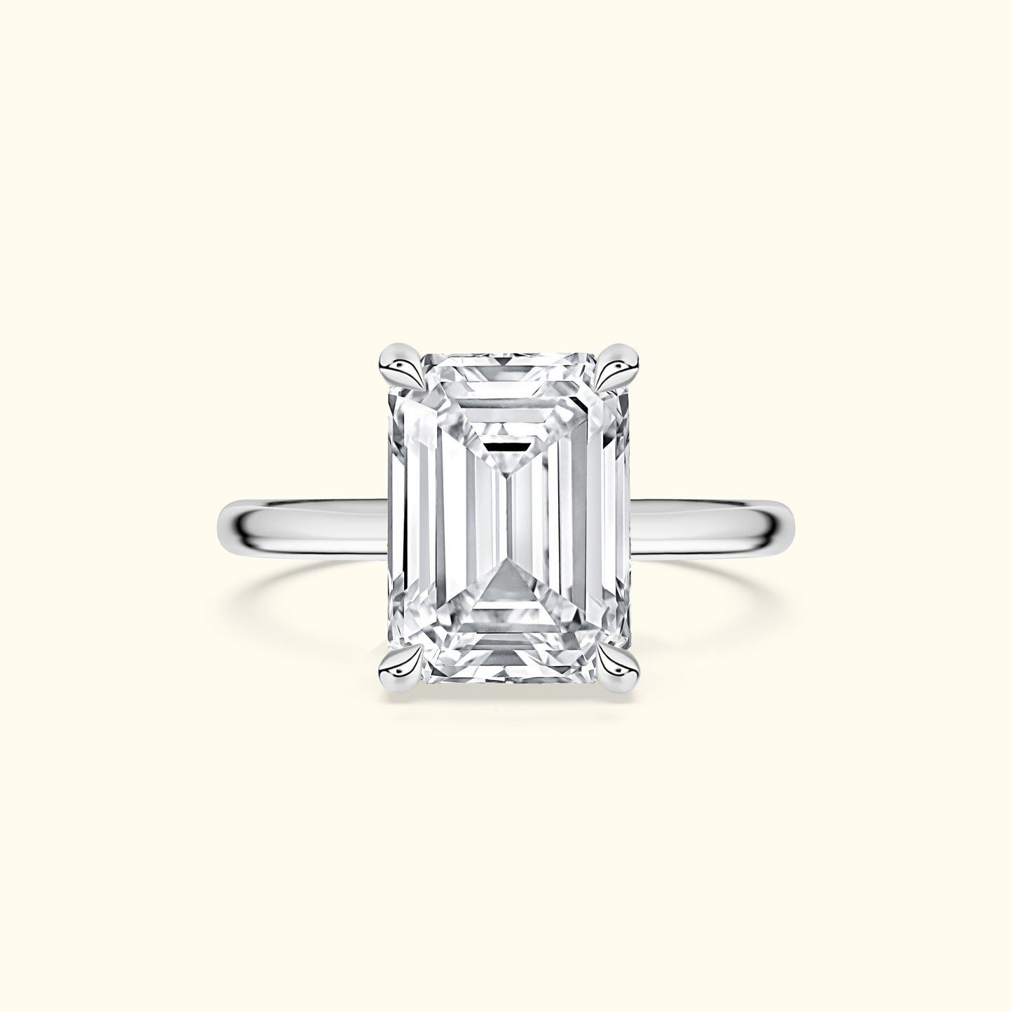 Elegant wide band ring featuring a large rectangular diamond centerpiece.