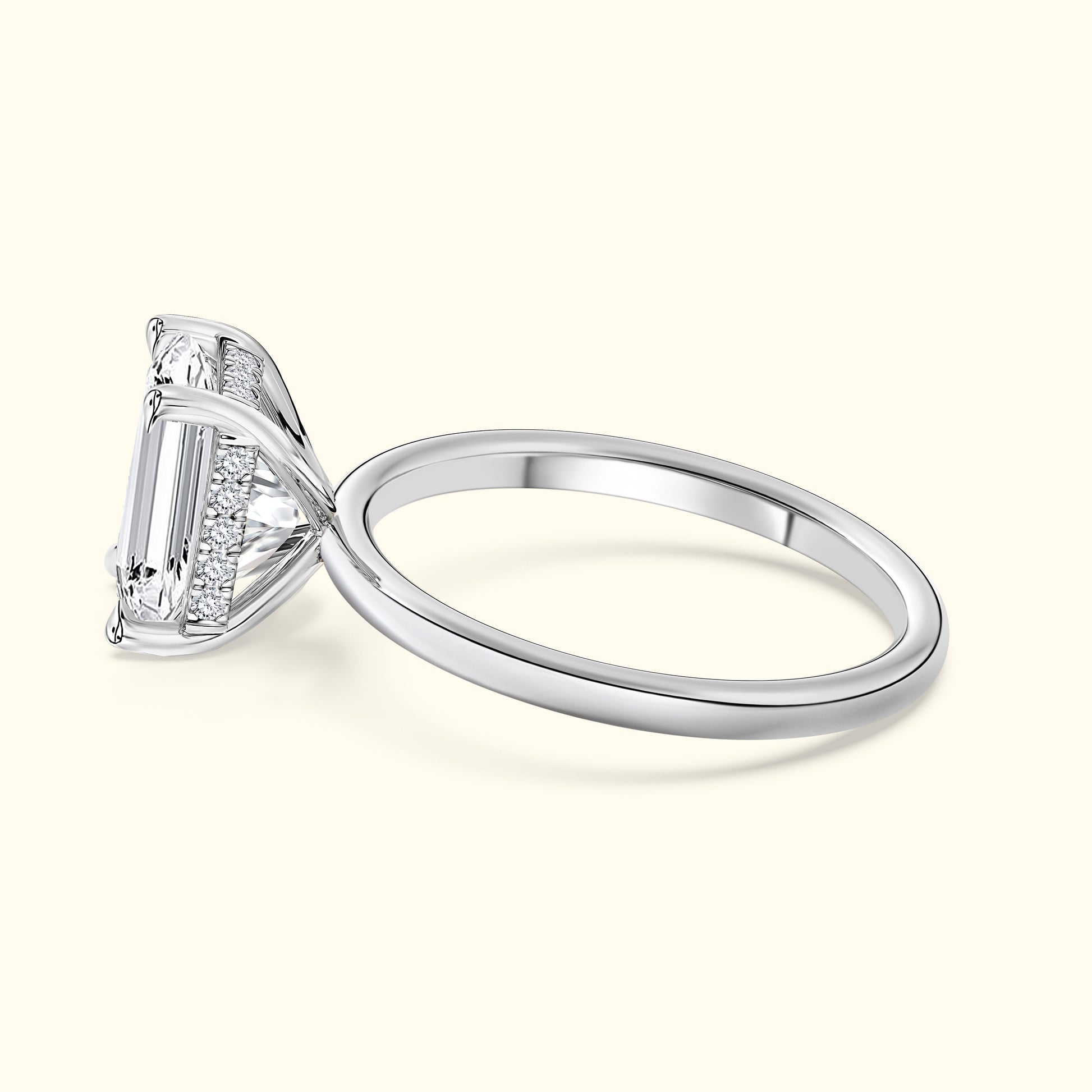 Elegant silver ring featuring a large emerald-cut diamond and intricate details.