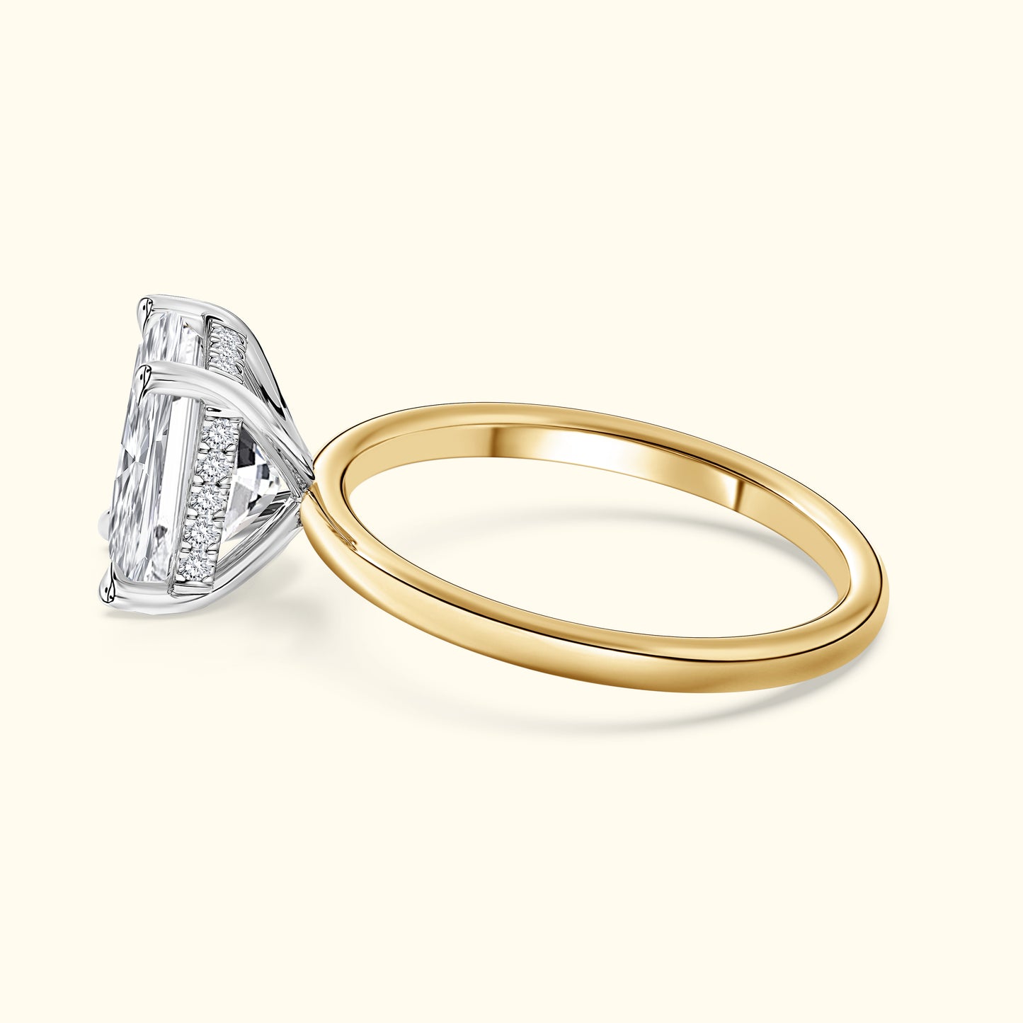 Elegant two-tone ring featuring a large diamond centerpiece and delicate band.