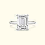Emerald-cut diamond ring with a sleek white gold band.