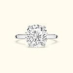 Elegant solitaire diamond ring with a round cut and silver band.