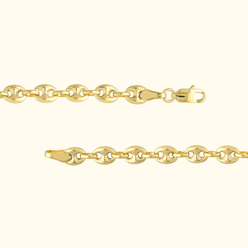 Gold chain bracelet with connected links and a secure clasp.