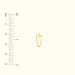 Gold star-shaped charm connected by a delicate chain, displayed with a ruler for size reference.