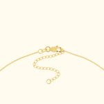 Gold necklace chain with a clasp and adjustable extension loop.