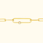 Gold chain bracelet with elongated links and a central diamond accent.