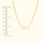 Delicate gold link necklace with a small diamond accent.