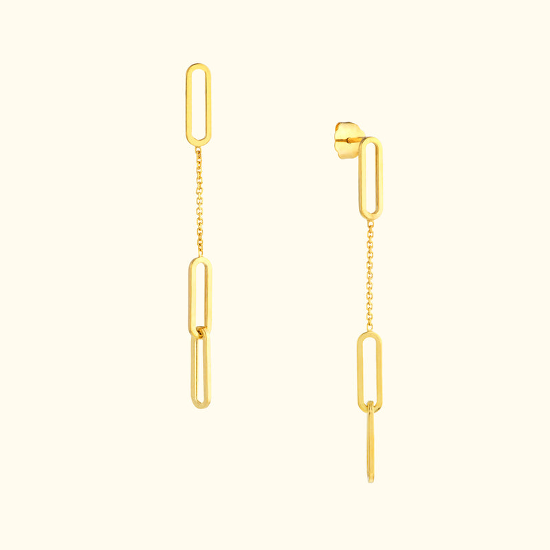 Long gold chain earrings featuring linked oval shapes for a modern look.