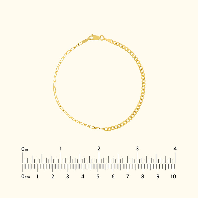 Delicate gold bracelet featuring a mixed link design, displayed on a light background.