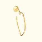 Gold hoop earring with a floral design, featuring a sleek, minimalist style.