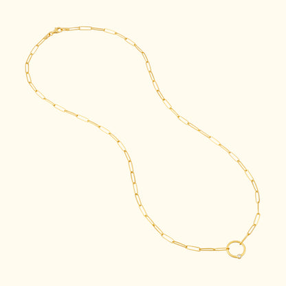 Gold chain necklace with elongated links and a round clasp.