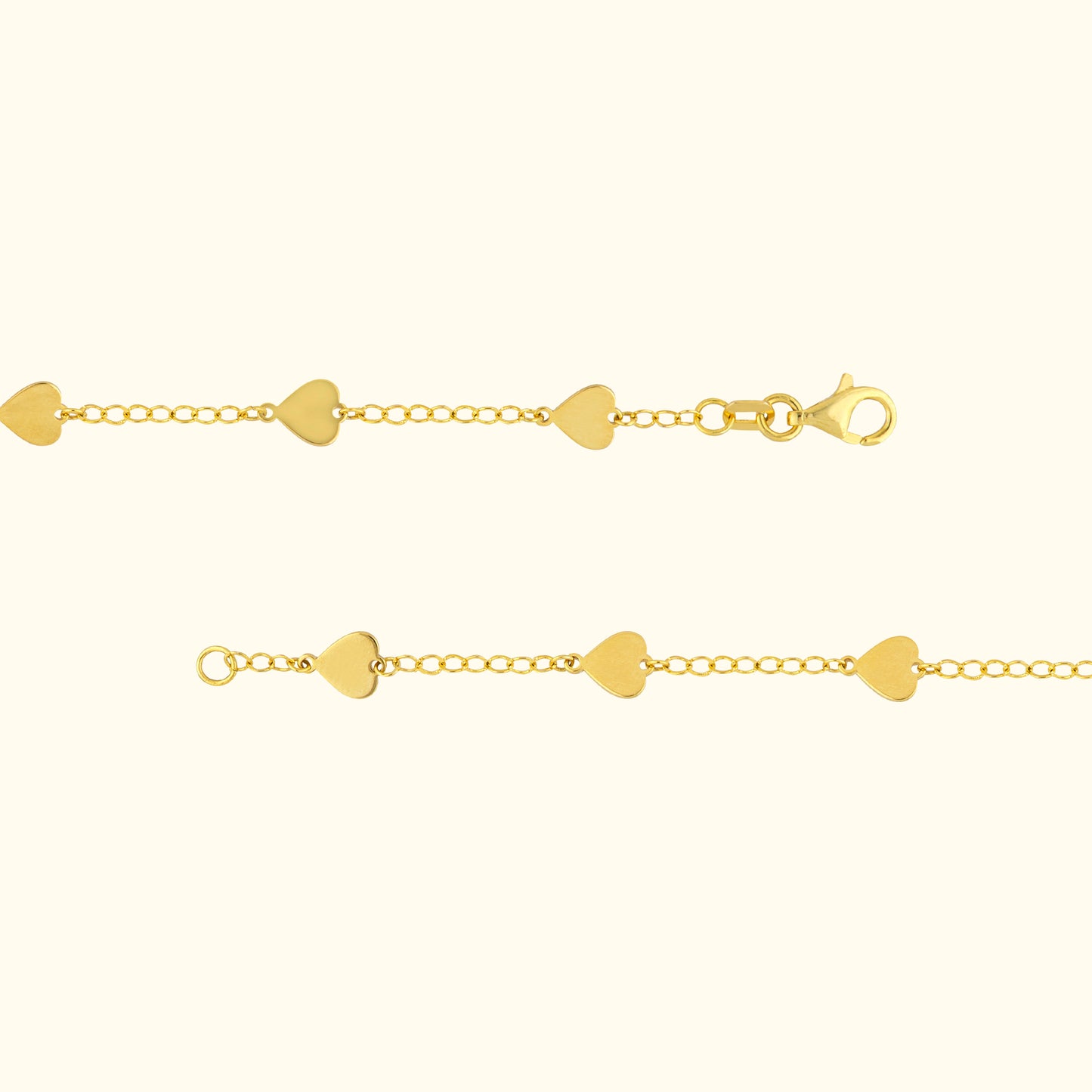 Gold bracelet with heart-shaped links and a lobster clasp.